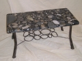 Marble top table with rock design below